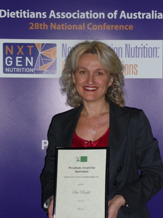 Sue acception the Award from the DAA