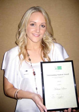 Melissa accepting her Award